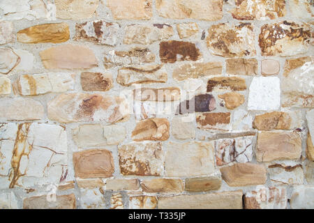 Ancient stone wall texture as background Stock Photo
