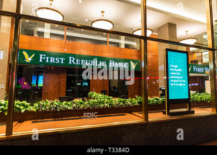 New York City, USA - July 30, 2018: Facade of a bank branch of First Republic Bank on the street at night in Manhattan, New York City, USA Stock Photo