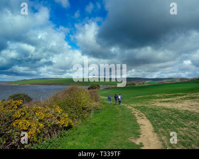 walkers near Chesil Beach and the Fleet on the Jurassic Coast  in Dorset southern England Stock Photo