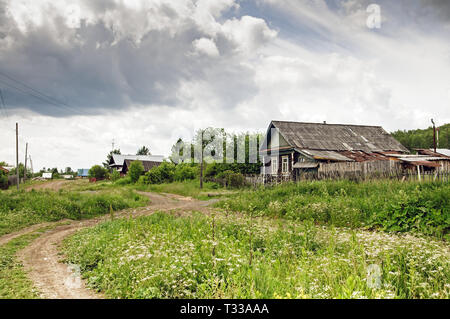 Russian village in summer cloudy day Stock Photo