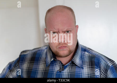 Portrait of a man with angry expression. Stock Photo