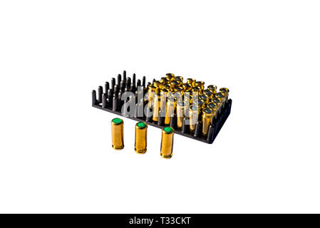A lot of blind cartridges for guns in the package with 8mm caliber, isolated on a white background with a clipping path and space for text. Stock Photo