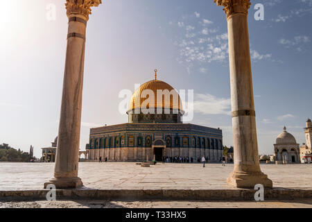 Scenic view of the Dome of the Rock through the arches of the scales of souls in old city of Jerusalem, Israel. The Islamic shrine shot through the co Stock Photo