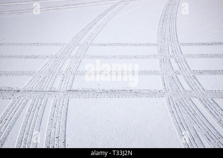 Traces of tires, in the snow, tire profiles, Stock Photo