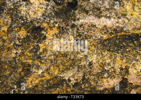 Textures and patterns of boulders in nature.Patterns and textures of rocks in nature.Textures and patterns of stones in nature, brown rocks, red rocks Stock Photo