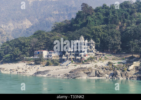 Old Ashram on the Bank of the Ganges river. An ancient temple on a ...