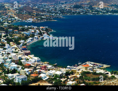 View to Agia Marina in leros island. White houses contrast with blue sea. Greek island. Stock Photo