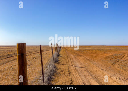 Australia, dog fence aka dingo fence, 5300 km long fence to protect pastures for sheeps and cattles Stock Photo