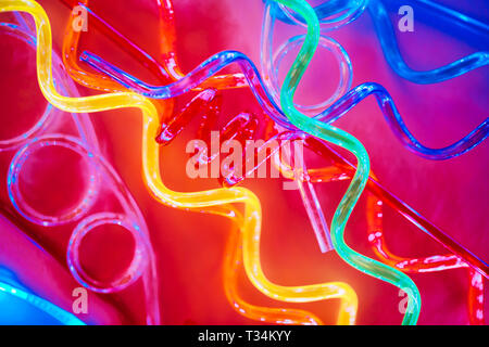 Neon plastic tubes. Modern and trendy version of eco concept. Stock Photo