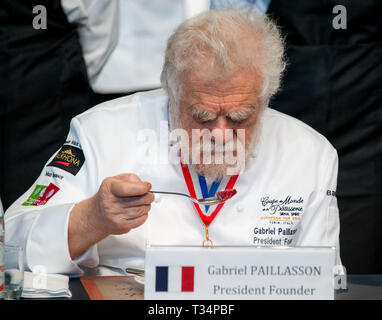 Turin, Italy, june 10th 2018: Gabriel Paillasson, president founder of World Cup of Pastry, tasting a cake to judge. Stock Photo