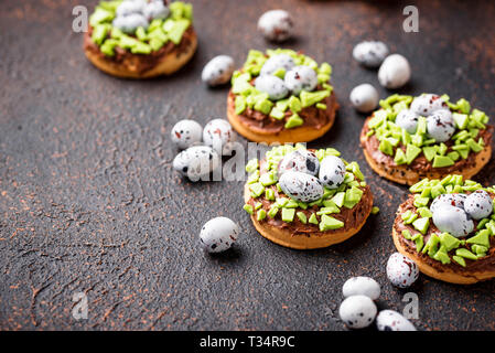 Easter  cookies in shape of nest with eggs Stock Photo