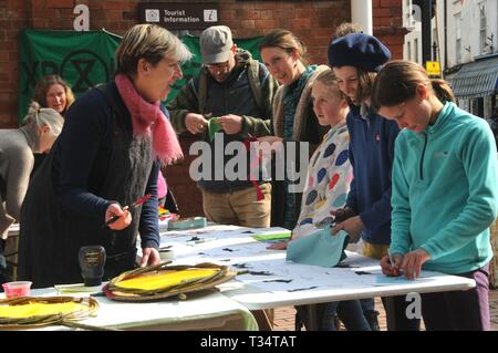 Kington, UK. 6th Apr, 2019. Extinction Rebellion preparations. Kington members of Extinction Rebellion held a banner workshop in the town ready for the climate change protest in London from April 15th. It is a fortnight of action planned to raise awareness and persuade the government to take action. Credit: Andrew Compton/Alamy Live News Stock Photo
