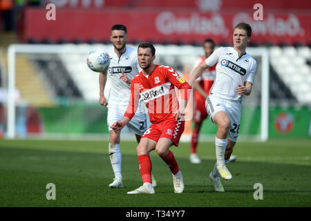 Swansea, Wales, UK. 06th April, 2019Jonathan Howson of Middlesbrough gets to the ball first during the Sky Bet Championship match between Swansea City and Middlesbrough at the Liberty Stadium, Swansea on Saturday 6th April 2019. (Credit: Jeff Thomas | MI News) Editorial use only, license required for commercial use. No use in betting, games or a single club/league/player publications. Photograph may only be used for newspaper and/or magazine editorial purposes. May not be used for publications involving 1 player, 1 club or 1 competition without written authorisation from Football Data Co Ltd. Stock Photo