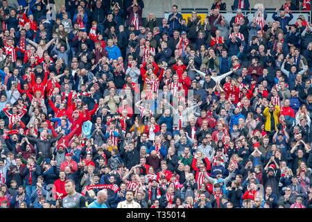 Milton Keynes, UK. 6th Apr, 2019Lincoln City's fans celebrate after winning the Sky Bet League 2 match between MK Dons and Lincoln City at Stadium MK, Milton Keynes on Saturday 6th April 2019. (Credit: John Cripps | MI News)  Editorial use only, license required for commercial use. No use in betting, games or a single club/league/player publications. Photograph may only be used for newspaper and/or magazine editorial purposes. May not be used for publications involving 1 player, 1 club or 1 competition without written authorisation from Football Data Co Ltd. Credit: MI News & Sport /Alamy Live Stock Photo