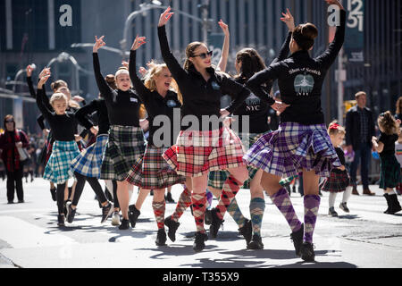 New York, USA. 6th Apr, 2019. Participants dance during the annual Tartan Day Parade in New York, the United States, on April 6, 2019. The parade, which consists of drummers, pipers and dancers, celebrated Scottish and Scottish American heritage. In 1998 the U.S. Senate declared April 6 to be National Tartan Day to recognize the contributions made by Scottish Americans to the United States. Credit: Michael Nagle/Xinhua/Alamy Live News Stock Photo