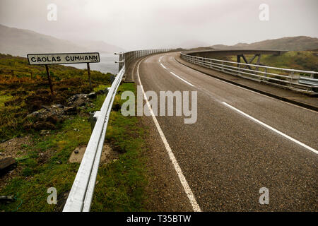 A rainy and foggy day at Kylesku Bridge in Sutherland, Scotland. Stock Photo