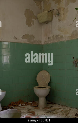 Close up of a toilet in an abandoned house Stock Photo