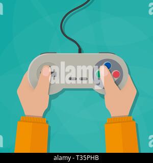 Hands holding wired old school gamepad. vector illustration in flat design on green background Stock Vector