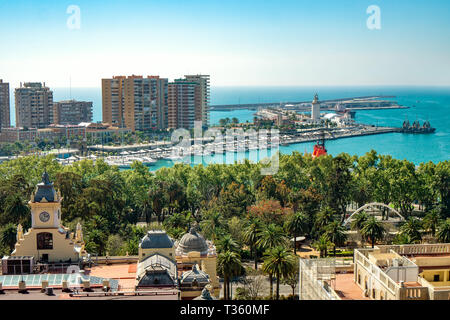 Aerial panoramic view of Malaga city, Andalusia, Spain in a beautiful summer day with the town hall the port and the blue sea Stock Photo