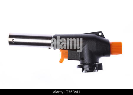 Manual gas torch burner, flame gun blow torch for camping, soldering or repair isolated on white background Stock Photo