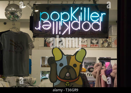 Los Angeles, CA / USA - August 14, 2018: Neon sign for the 'Popkiller' storefront in Downtown Los Angeles. Stock Photo