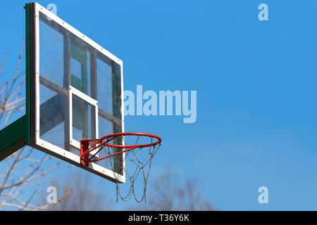 closeup basketball hoop outdoor on blue sky background Stock Photo