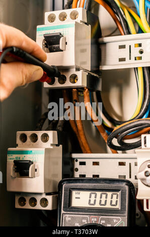 Fuses in a opened fusebox Stock Photo