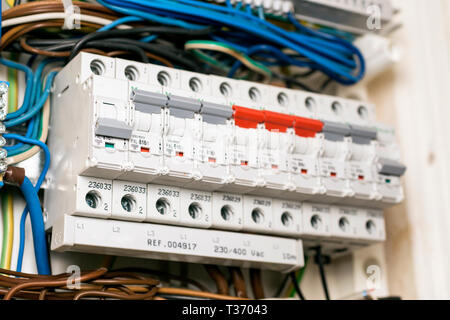 Fuses in a opened fusebox Stock Photo