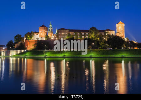 Wawel Royal Castle at night in Krakow, Poland, river view. Stock Photo