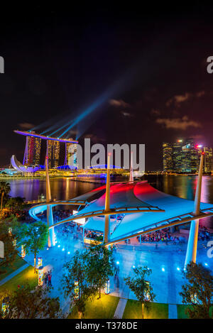 SINGAPORE CITY, SINGAPORE - MARCH 6 , 2019: Theatres by the bay and the Spectra Light and Water Show at Marina Bay Sands Stock Photo