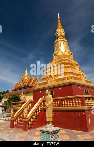 Cambodia, Kampong (Kompong) Cham, Wat Dei Doh, Buddhist monastery, statue at steps of golden pagoda Stock Photo