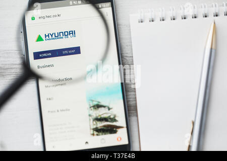Los Angeles, California, USA - 3 April 2019: Hyundai official website homepage under magnifying glass. Concept Hyundai Engineering logo visible on tab Stock Photo