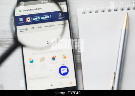 Los Angeles, California, USA - 3 April 2019: HDFC Bank Limited official website homepage under magnifying glass. Concept HDFC Bank Limited logo