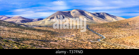 Impressive volcanic landscape in Fuerteventura island,Spain Stock Photo
