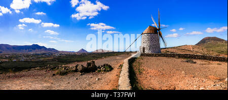 Traditional windmill in Fuerteventura island,La Oliva village,Spain. Stock Photo