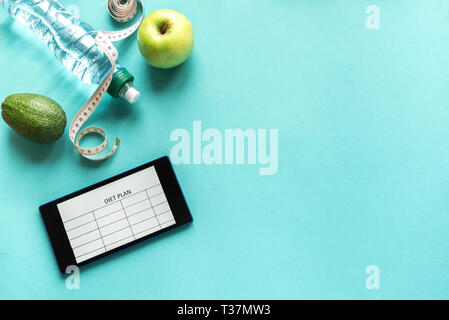 Calories counting , diet , food control and weight loss concept. woman  using Calorie counter application on tablet at dining table with fresh  vegetabl Stock Photo - Alamy