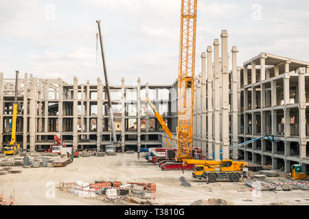 Sibiu, Romania - April 06, 2019. workers at The mall Festival Centrum building site Stock Photo