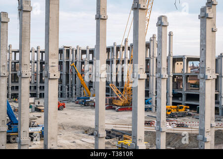 Sibiu, Romania - April 06, 2019. workers at The mall Festival Centrum building site Stock Photo