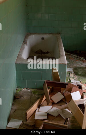 Close up of a bathtub in an abandoned house Stock Photo