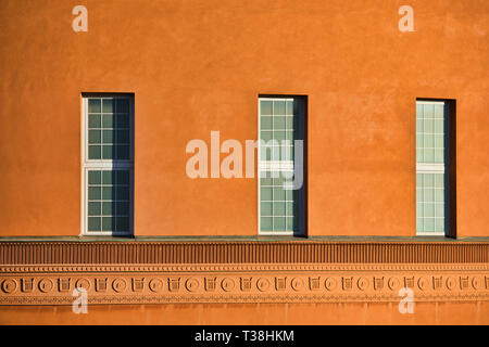 Stockholm Public Library (Stadsbiblioteket by Gunnar Asplund 1928) orange rotunda, figurative stucco border and windows, Stockholm, Sweden Stock Photo