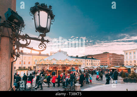 Helsinki, Finland - December 10, 2016: Christmas Holiday Carousel In Senate Square In Winter Day Stock Photo