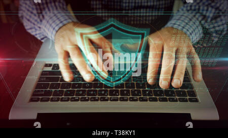Man typing on laptop keyboard watching for shield on hologram screen. Internet safety, cyber security and computer protection concept. Front view of w Stock Photo