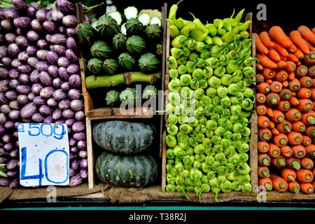 Display of a variety of colourful fresh vegetables on sale in Kandy  market, Sri Lanka Stock Photo