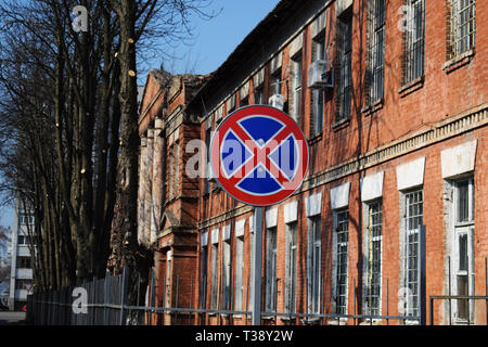 Traffic sign No Stopping on a brick building background Stock Photo