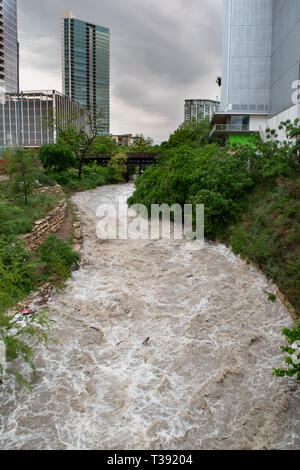 Major storms and heavy spring rains on April 6th, 2019, in central Texas cause heavy flooding to Shoal Creek in downtown Austin. Stock Photo