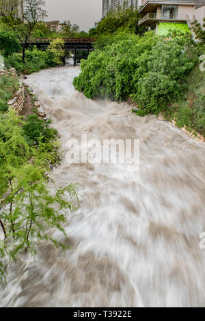 Major storms and heavy spring rains on April 6th, 2019, in central Texas cause heavy flooding to Shoal Creek in downtown Austin. Stock Photo