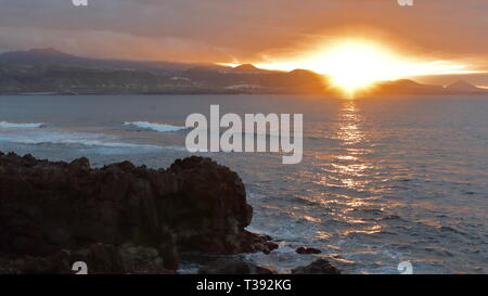 Atardecer en playa de gran canaria.  Sunset in Gran Canaria beach. Stock Photo