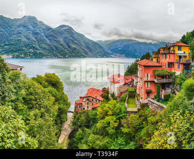 Panoramic view over the Lake Como, as seen from the town of Bellano, Italy Stock Photo