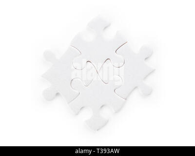 Four white puzzle pieces. Isolated on white, clipping path included Stock Photo