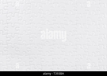 White blank puzzle close up. Background and texture Stock Photo